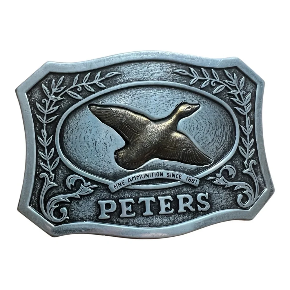 VTG. Peters Ammunition Remington Pewter Belt Buckle with flying duck.